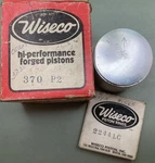 New Wiseco 370 P2 Piston & 2244LC Ring Set For '74-'76 Kawasaki KX125. Price: $75.00.