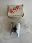 Suzuki Oem Top End Piston TC125 1973 1977 TS125 1978 1981 # 12100-48000-050 New. Price: $60.00.