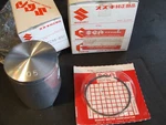 Suzuki RM12K 1989 +.5MM Piston Kit 12103-27810-050 12110-27C06-050 New:. Price: $36.44.