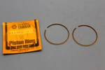 Nos Yamaha 1980-1982 YZ80 1ST O/s 0.25 Piston Ring Set Part# 5X2-11601-10-00 New. Price: $8.95.