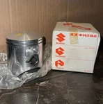 Suzuki RM250 Piston 12110-28E10-0F0 New. Price: $40.00.