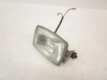 Kawasaki Bayou KLF185A Headlight Lamp Lens 23004-1176 1985-1987 Used. Price: $45.00.